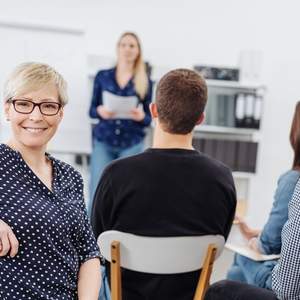 Teilnehmerin in einem Seminar